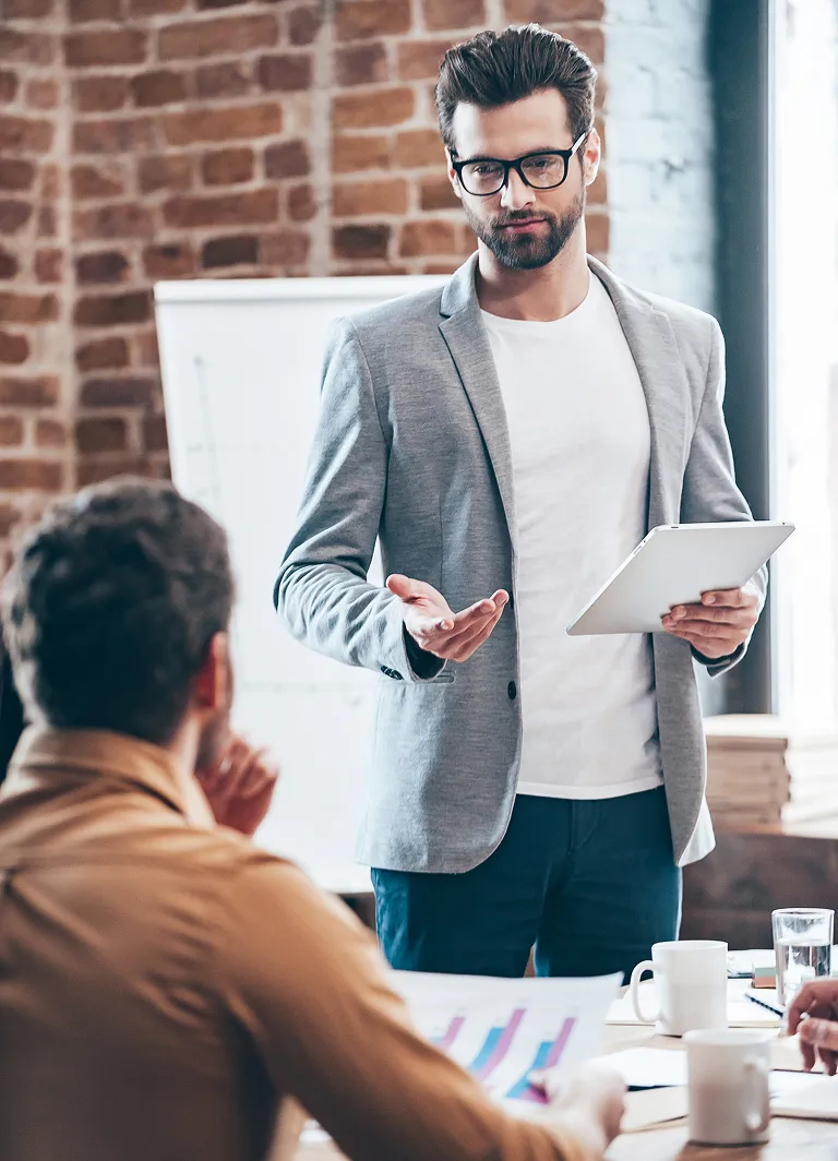 Business consultant presenting with a tablet